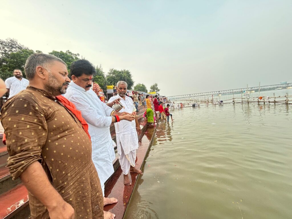 Mohan Shrivastava offered water for the oblation to ancestors.
