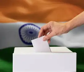 A hand is putting his vote that are the old vison of